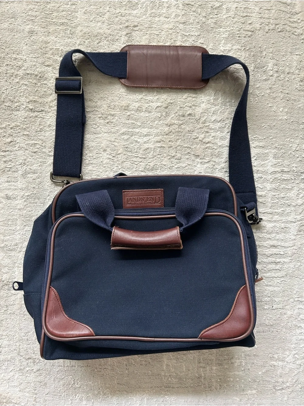 Lands’ End direct merchants navy travel bag with removable shoulder strap